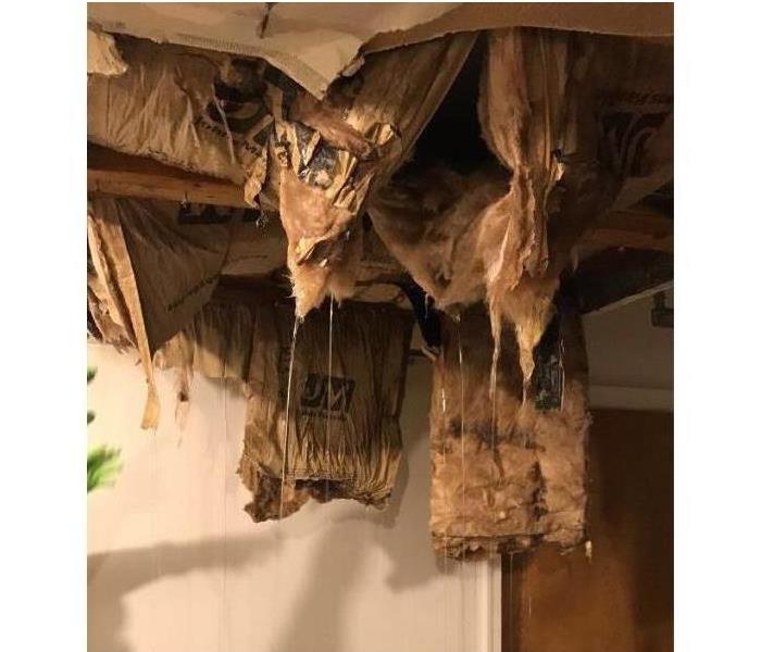 hanging batten insulation from broken ceiling